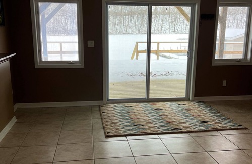 Delton House | Idyllic, Waterfront Home on Crooked Lake with 2.5 Wooded Acres