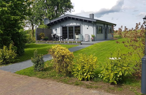 Martensrade House | Idyllisches Blockbohlenhaus mit eigenem Garten und Sauna zum Wohlfühlen