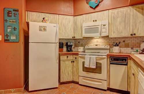 New Braunfels Condo | Immaculate Comal riverfront! Across from Schlitterbahn! Pool & river access!
