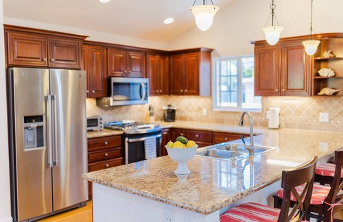 Coronado House | Immaculate Single Level Spanish Style Home Nestled near the Beach & Sunset Park