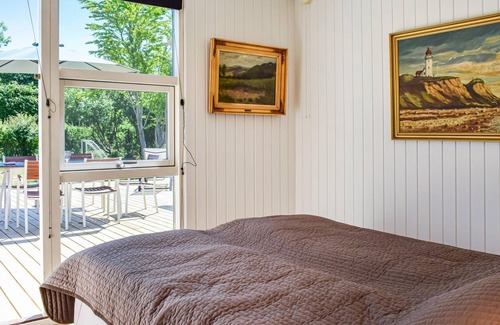 Skibby House | In the cozy cottage area of Vellerup, just a few minutes walk from the fjord, you will find this wel