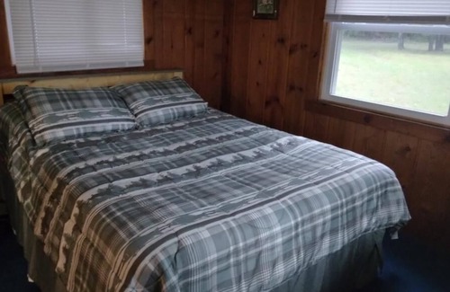 Atlanta Cabin | In the heart of Michigan's Elk Country...on the bank of Crooked Creek & 20 acres