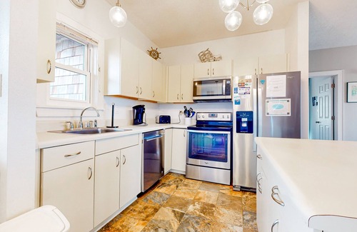 Avon Condo | Incredible waterfront condo with amazing ocean views, pool, deck, & beach access