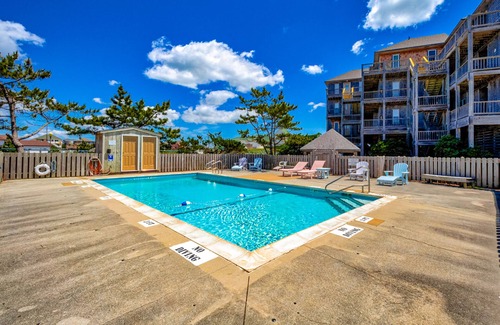Avon Condo | Incredible waterfront condo with amazing ocean views, pool, deck, & beach access