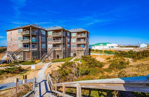 Avon Condo | Incredible waterfront condo with amazing ocean views, pool, deck, & beach access