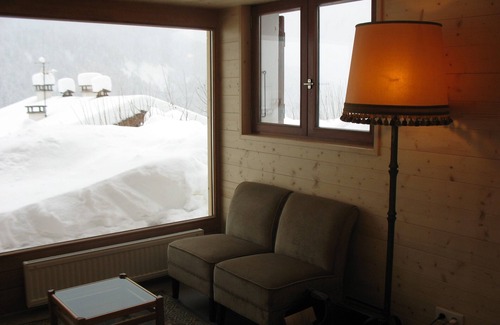 Le Grand-Bornand Apartment | Individual chalet facing the Aravis, south garden level with terrace and lawn