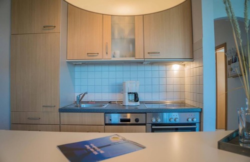 Fehmarn Apartment | Inselblume 78 - vacation home with beach chair in Burgtiefe