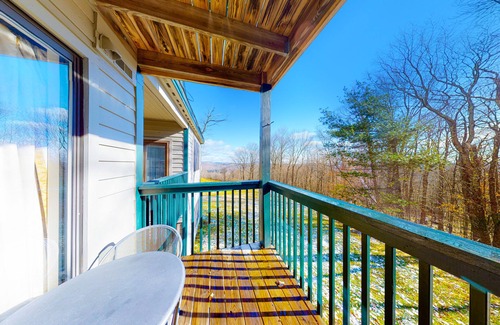 Ludlow Condo | Inviting condo with a fireplace, hot tubs, pool, tennis & washer/dryer