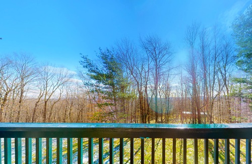 Ludlow Condo | Inviting condo with a fireplace, hot tubs, pool, tennis & washer/dryer