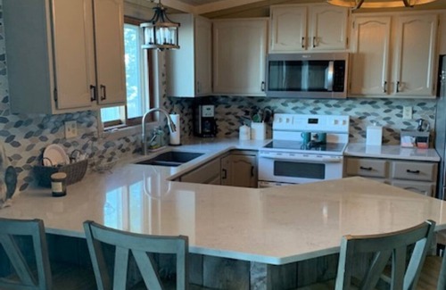 Delta County House | Isabella Shores - Beachfront Home and Winter Retreat