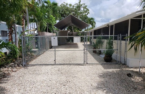 Key Largo Village House | Island Paradise with private beach & private bay sunset views.