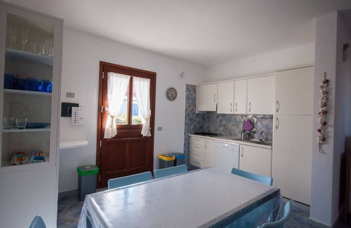 Monte Petrosu House | Apartment with garden and wi-fi in residence with swimming pool