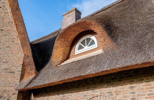 Archsum Apartment | Juliane - Gallery suite - thatched. Nature. Garden.