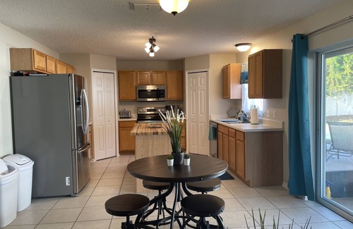 Florida Shores House | Just minutes from the ocean Lg 4 bedroom with fenced in saltwater pool!