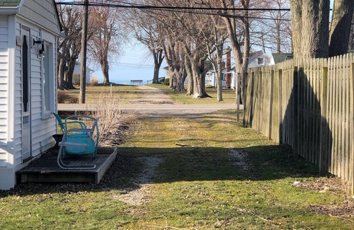 Geneva-on-the-Lake Cottage | Kenzie's Sandcastle is a cozy 1 bedroom cottage with a partial lake view.