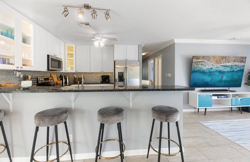 Bay Point House | Key West Beach House with heated pool, tiki, and dock.♿︎