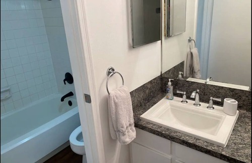 Beaumont Condo | KING Bed, Pool, TV Sports Pack, WiFi, Washer and Dryer in Unit!
