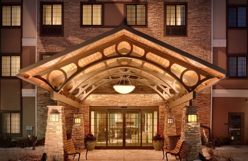 Omaha Condo | King Suite. Free Breakfast. Pool. Gym. Great for Business Travelers!