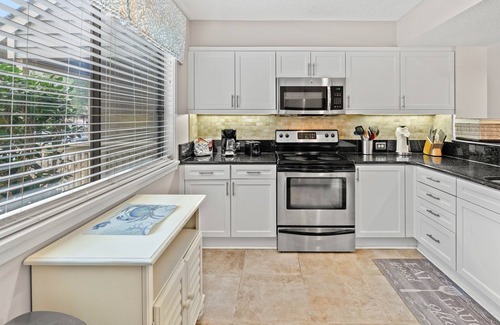 Arcadian Shores Villa | Kingston WHP 2B Ground level Villa w/pool/beach