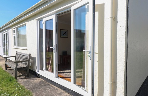 Scurlage Cottage | KITES - 52 GOWER HOLIDAY VILLAGE, pet friendly in Port Eynon