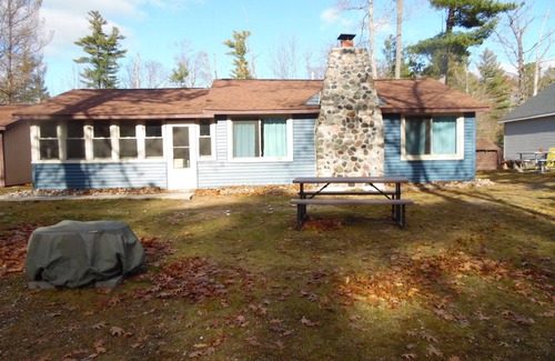 East Tawas House | Knotty Pine Cabin short distance to Lake Huron Access! Near Tawas Point