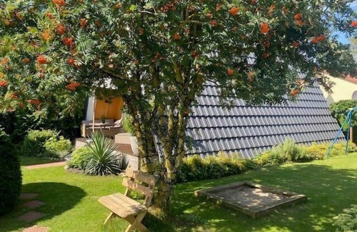 Kroeslin House | Komfortabeles Finnhuetten Ferienhaus im Fischerdorf Freest