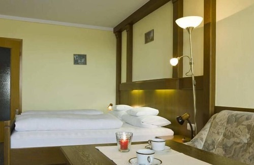 Aichmuhle Apartment | Komfortables Einraumappartement (31qm) mit kombiniertem Wohnschlafraum