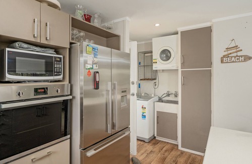 Whiritoa House | Kon Tiki Retreat - Whiritoa Beach Holiday Home