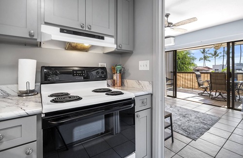 Historic Kailua Village Condo | Kona Plaza#202 2ND FLOOR OCEAN VIEW IN HEART OF KONA TOWN! AC & Elevators!