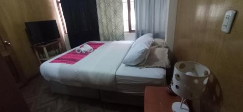 Cusco Historic Center Apartment | Kusi Uyacha Casa hospedaje Habitación 2-A cama matrimonial con baño compartido