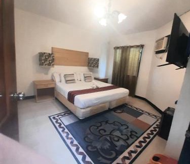 San Juan House | Kwarto's