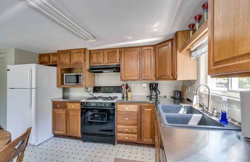 Alexandria Bay Apartment | kyacks and canoes can tie up in Backyard if you come in from the River