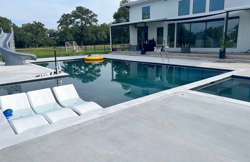 Somerville House | Kyle Field is easily accessible! Modern home with pool/hot tub & amazing views!