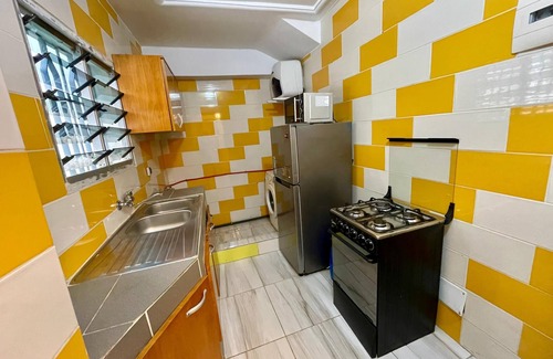 Angre Apartment | La Siesta-Abidjan- Enchanting One Bedroom Split-Mezzanine Apartment with AC-WIFI