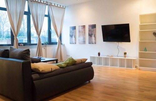 Langenfeld Apartment | LA05 Loft apartment in Langenfeld with the language assistant Alexa, 50 inch TV and free WiFi