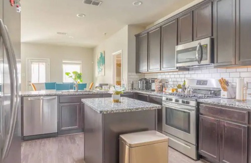 Missouri City House | Lake Olympia home seasonal pool, patio BBQ pit, & play area.