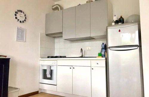 Sala Comacina Apartment | Lake View. Beautiful three-room apartment with garden and pool. Lake Como.