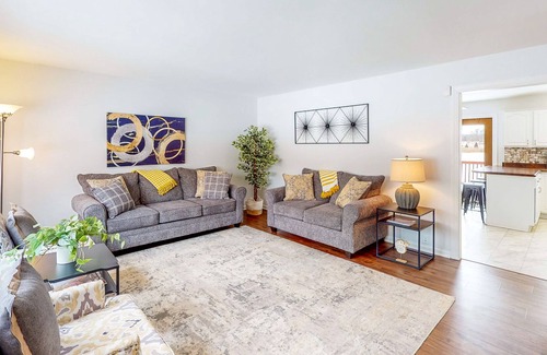 Portage House | Lake-view home with private hot tub, deck