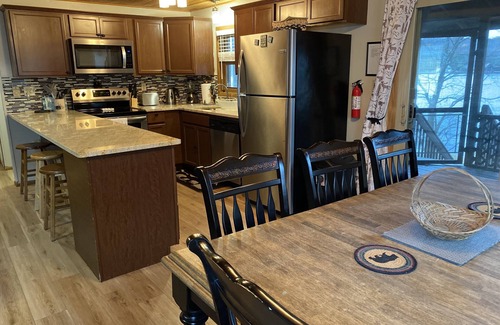 Pocono Lake House | Lakefront; amazing sunsets; dock; game room; fire pit, boats, hot tub; sleeps 8