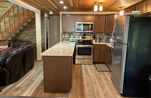 Pocono Lake House | Lakefront; amazing sunsets; dock; game room; fire pit, boats, hot tub; sleeps 8
