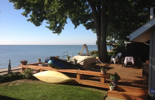 Stony Point House | LAKEFRONT, BEACH, SWIM, FISH, BBQ at this beautiful Stony Point cottage.