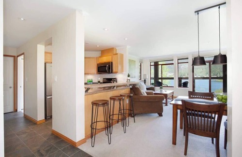 Nicklaus North Condo | Lakefront condo w/mountain views & fireplace