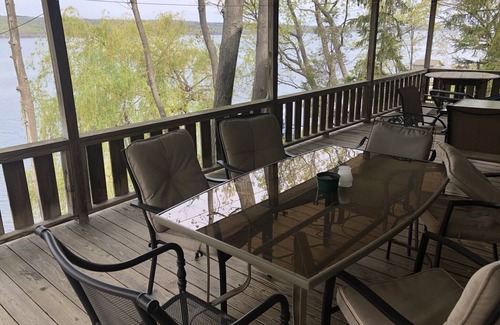 Valois Cottage | Lakefront cottage with private deck and dock, amazing porch with sunset views