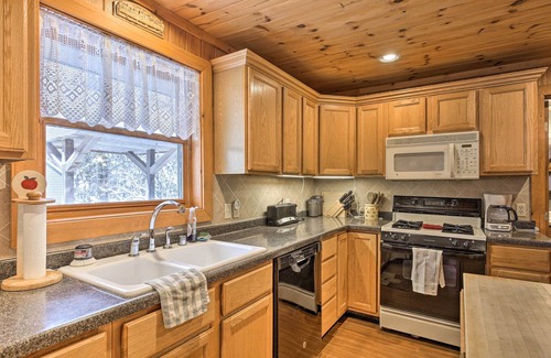 Park Falls Cabin | Lakefront Escape w/Fishing Pier & Snowmobiling!