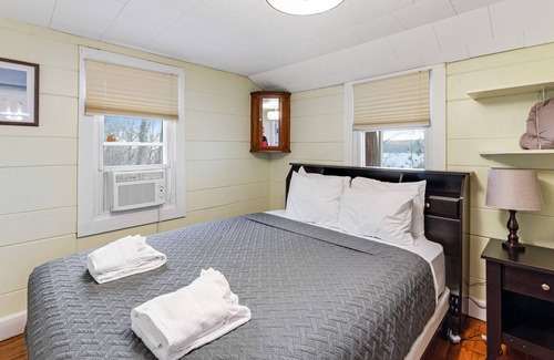 Valois Cottage | Lakefront getaway with a private dock, full kitchen, sunroom, & deck