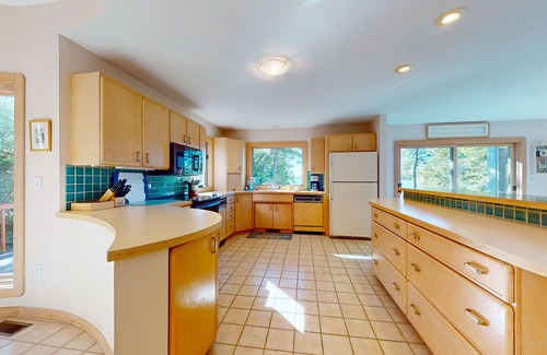 Charlevoix House | Lakefront home on Oyster Bay w/private dock, beach, fire pit, & hammock