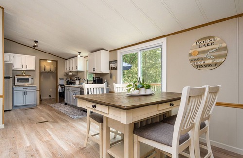 Piney Flats House | Lakefront home, peaceful setting, beautiful views of the lake and floating dock.