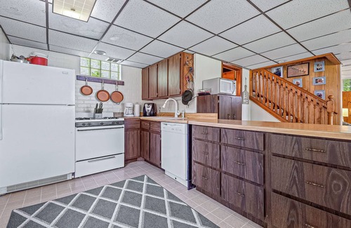 Johannesburg House | Lakefront home with large yard, dock, gas grill, WIFI near golf & ATV trails!