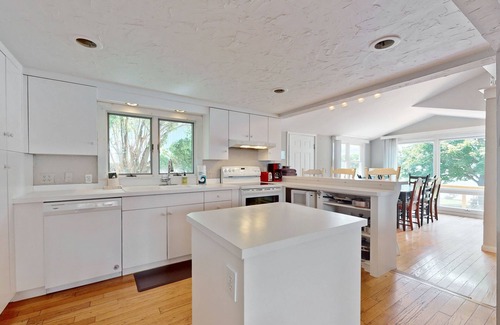 Valois House | Lakefront home with large deck, dock, kayak, & gorgeous views