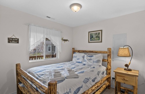 Manson House | Lakefront Home with Private dock, hot tub, SUP and Canoe